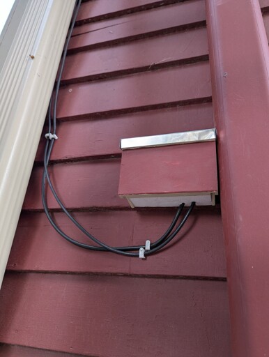 coax exiting side of house